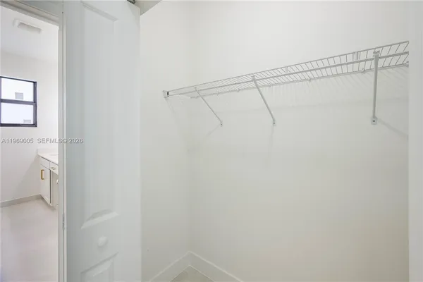 a view of a room with racks on the wall