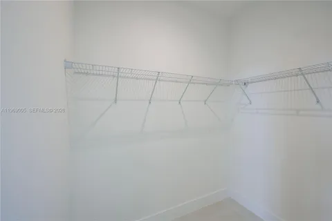 a view of a room with racks on the wall