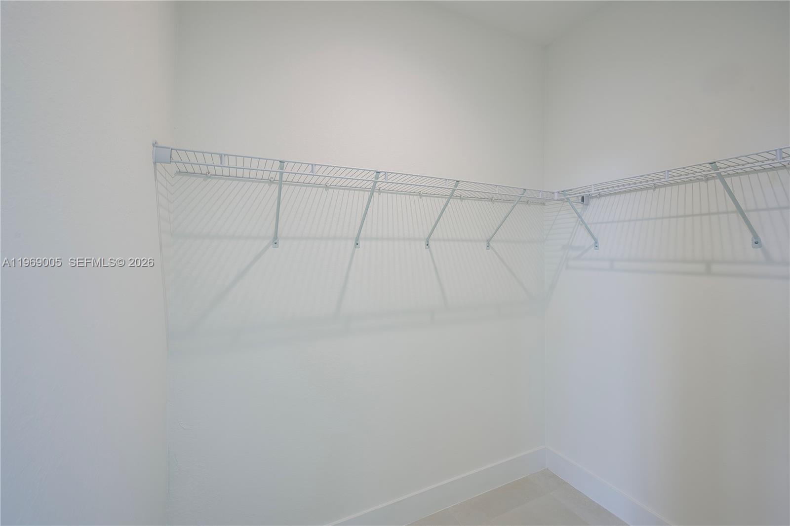 32242 Southwest 194th Avenue Homestead, FL 33030 - Photo 29 of 42 a view of a room with racks on the wall