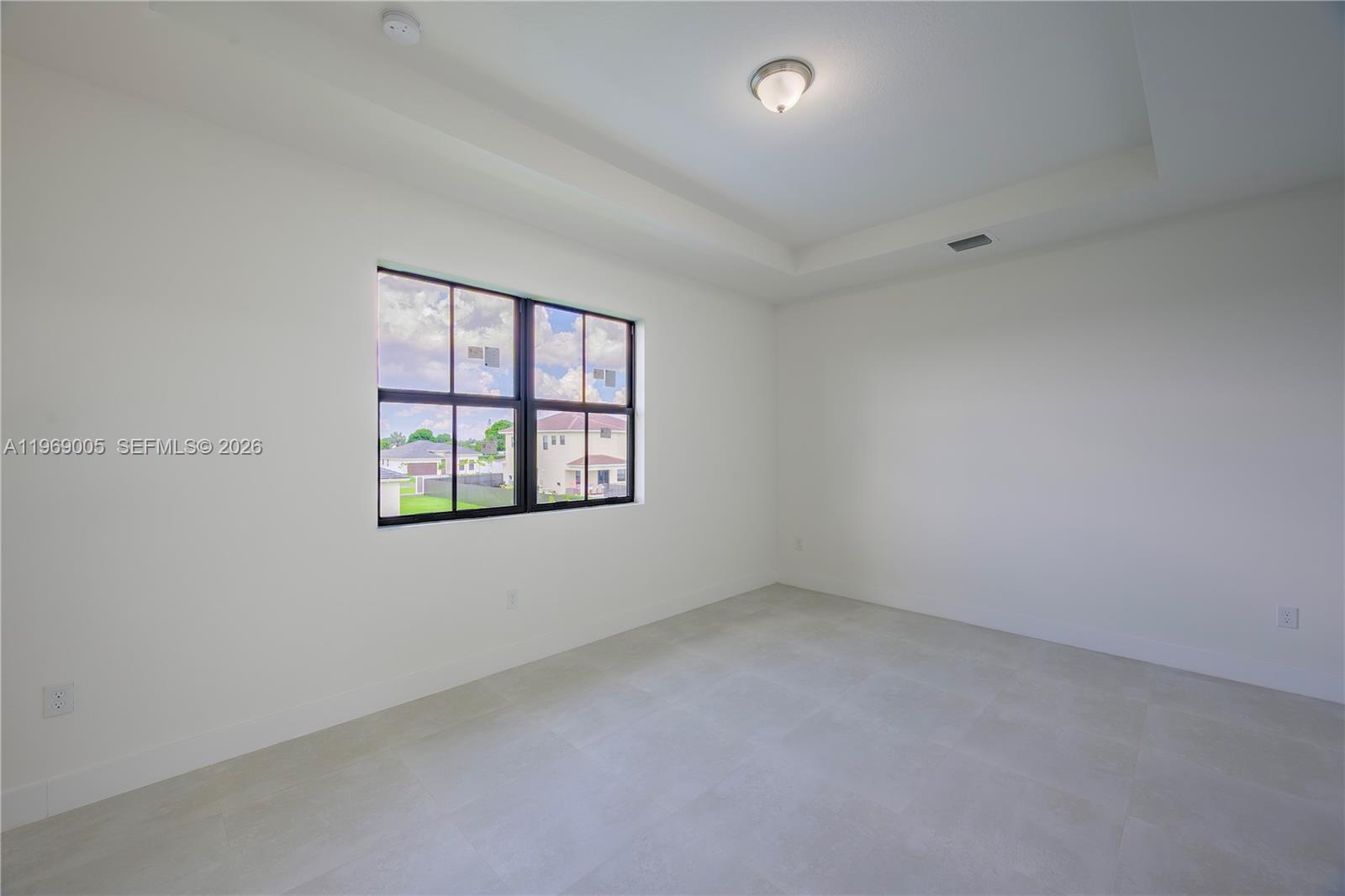 32242 Southwest 194th Avenue Homestead, FL 33030 - Photo 38 of 42 an empty room with windows