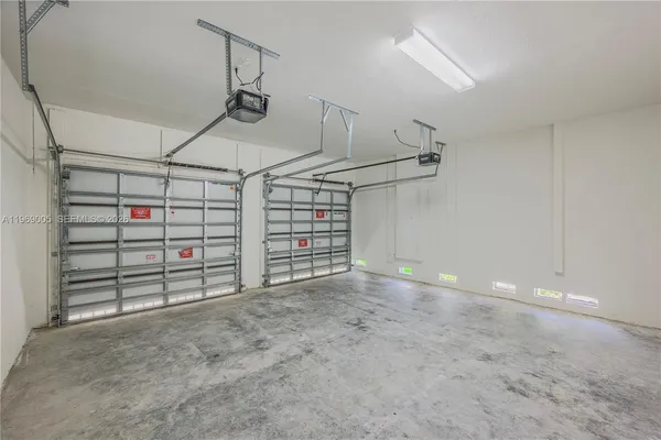 a view of house with yard and deck