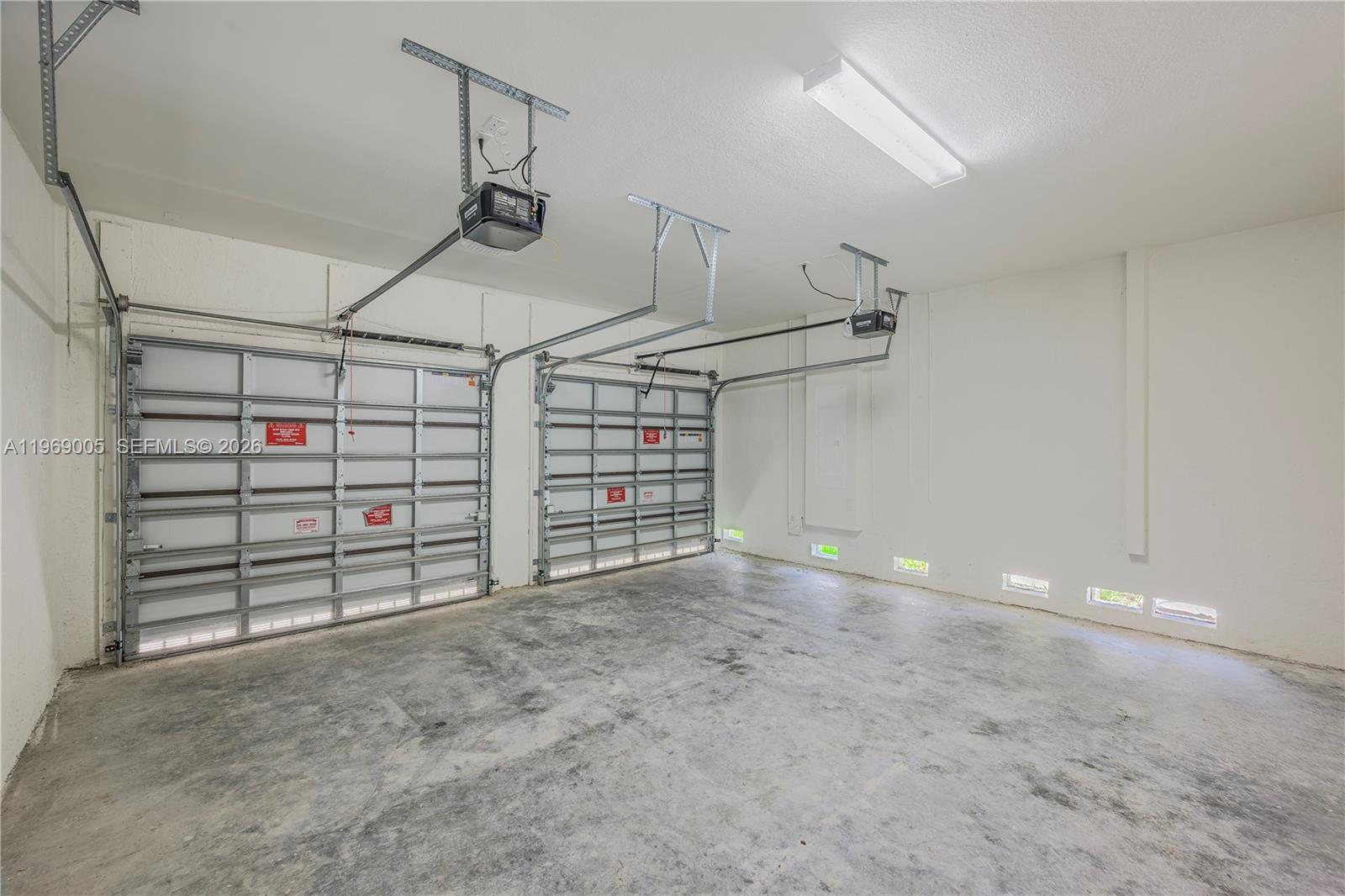 32242 Southwest 194th Avenue Homestead, FL 33030 - Photo 40 of 42 a view of a garage room