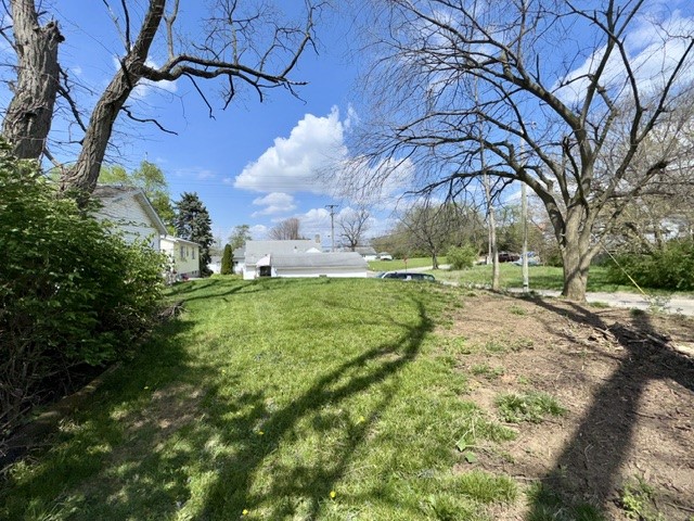 1701 West Jefferson Street Springfield, OH 45506 - Photo 18 of 18 This spacious green lot is ready for development, offering ample room for a new home.