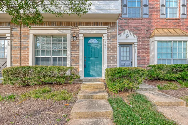 a front view of a house having yard