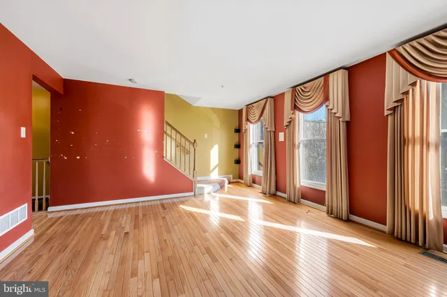 a kitchen with stainless steel appliances granite countertop a stove a sink dishwasher and a microwave