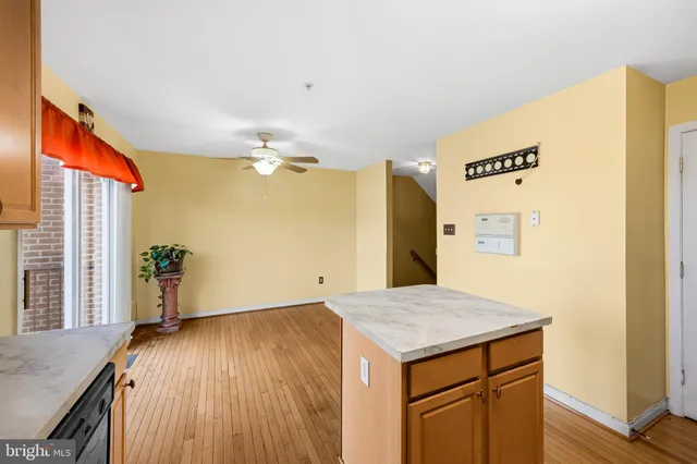 a view of a livingroom with wooden floor