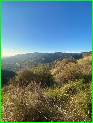 a view of mountain with lake view