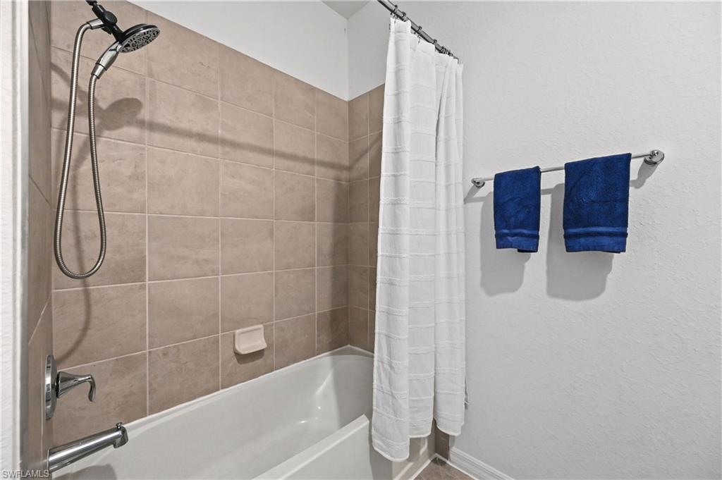 2828 Citrus Street Naples, FL 34120 - Photo 26 of 40 a bathroom with a shower