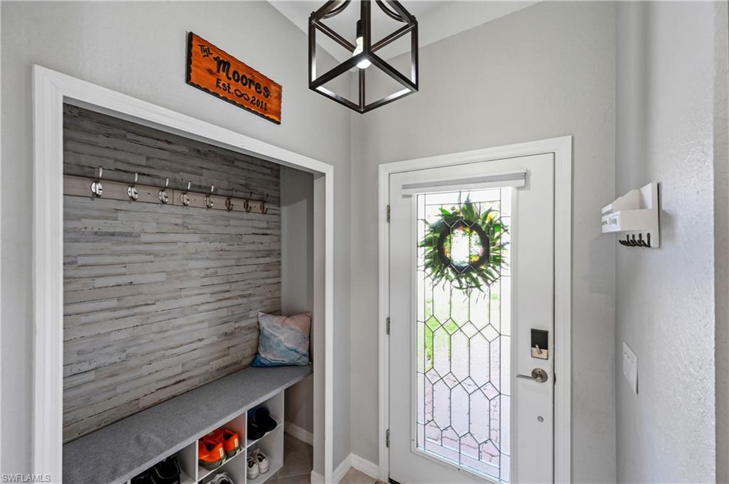 2828 Citrus Street Naples, FL 34120 - Photo 3 of 40 a view of hallway with seating area