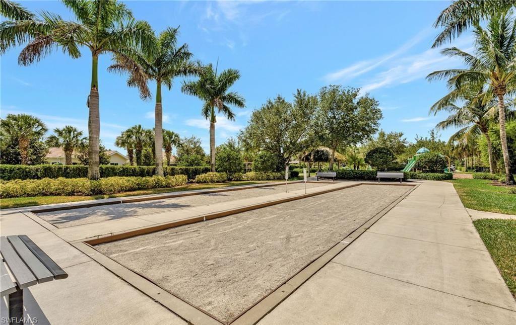 2828 Citrus Street Naples, FL 34120 - Photo 39 of 40 a view of swimming pool with palm trees