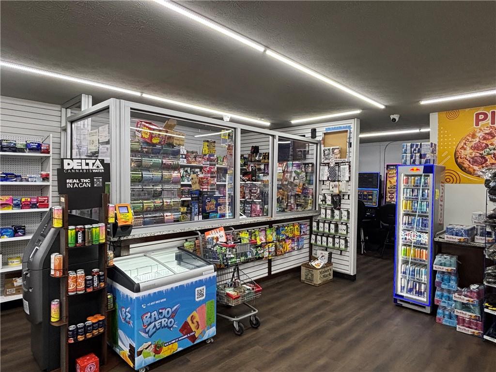 64 McNeal Road Winder, GA 30680 - Photo 5 of 12 a room with lots of furniture and clutter