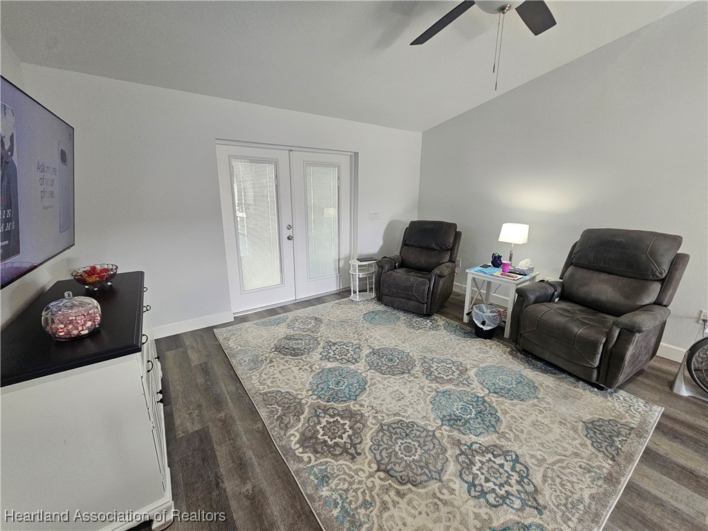 2950 North Sedgewick Road Avon Park, FL 33825 - Photo 3 of 16 a living room with furniture and a flat screen tv