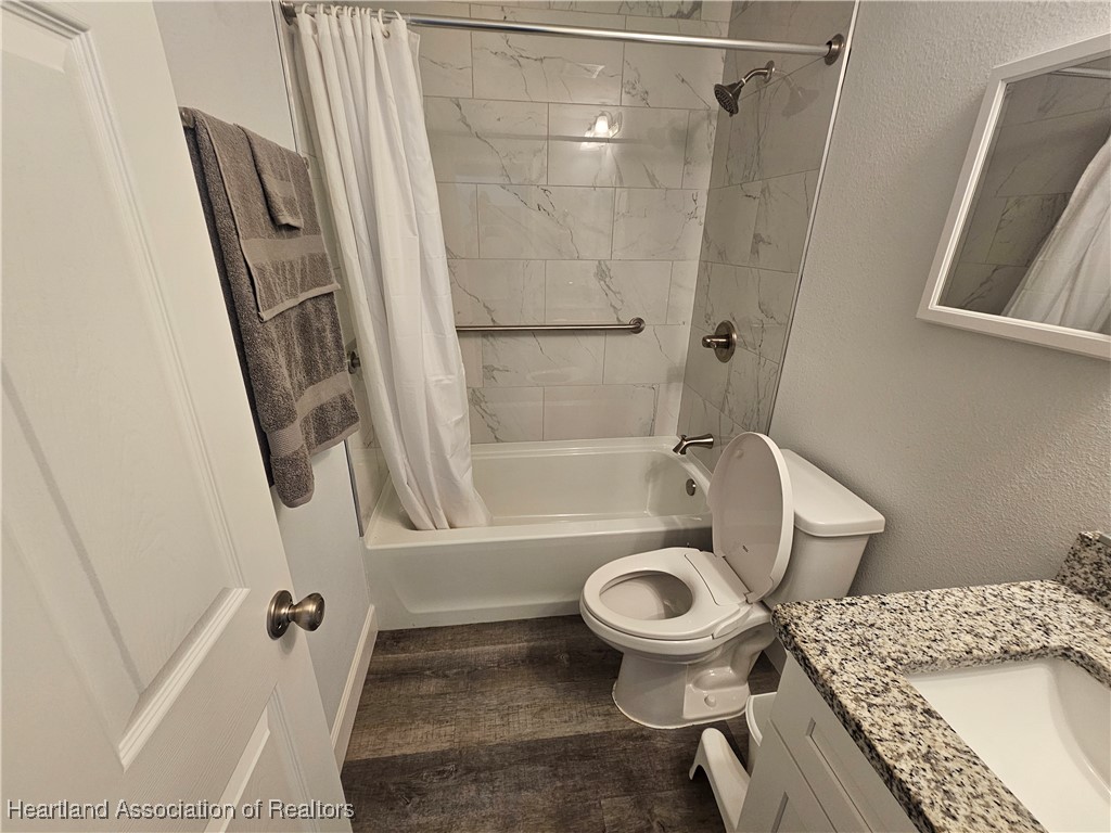 2950 North Sedgewick Road Avon Park, FL 33825 - Photo 5 of 16 a bathroom with a sink and a toilet
