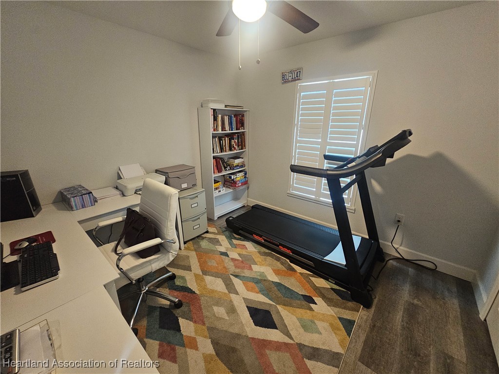 2950 North Sedgewick Road Avon Park, FL 33825 - Photo 6 of 16 a room with gym equipment and view of living room