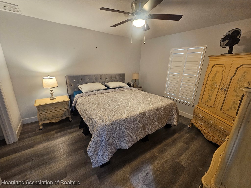 2950 North Sedgewick Road Avon Park, FL 33825 - Photo 9 of 16 a bedroom with a bed and closet