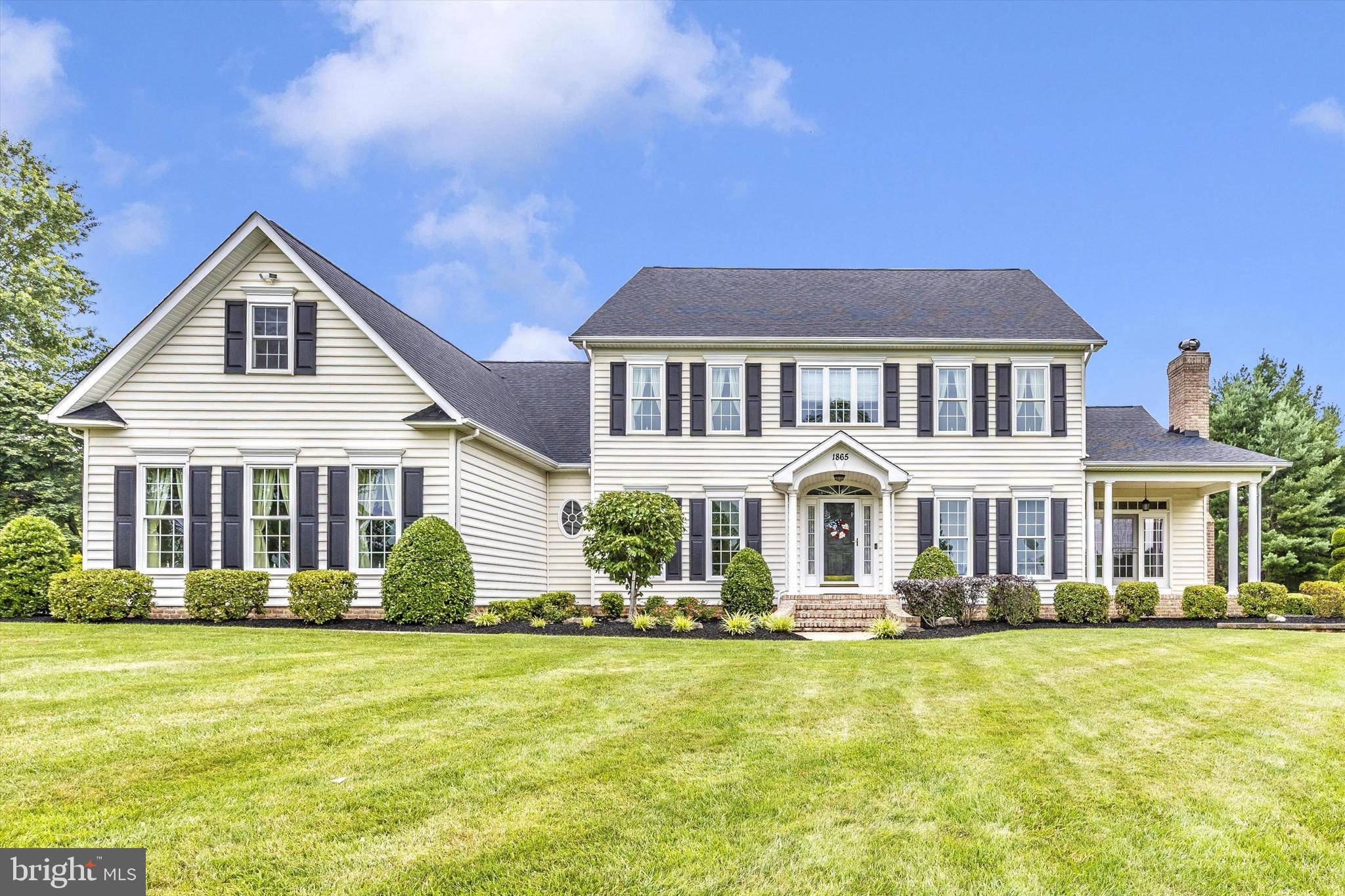 1865 Florence Road Mount Airy, MD 21771 - Photo 1 of 144 a front view of a house with a yard