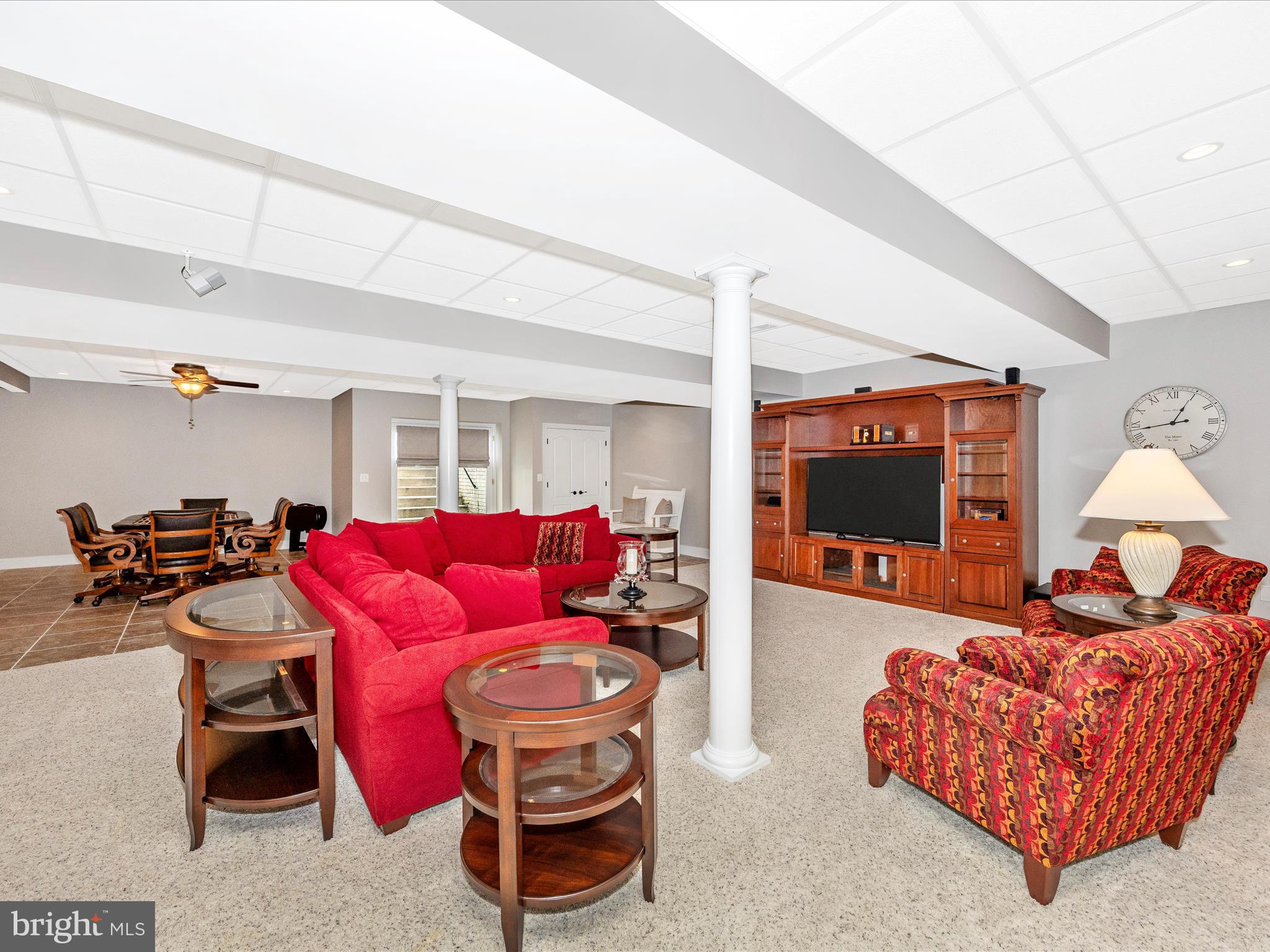 1865 Florence Road Mount Airy, MD 21771 - Photo 114 of 144 a living room with furniture and a flat screen tv