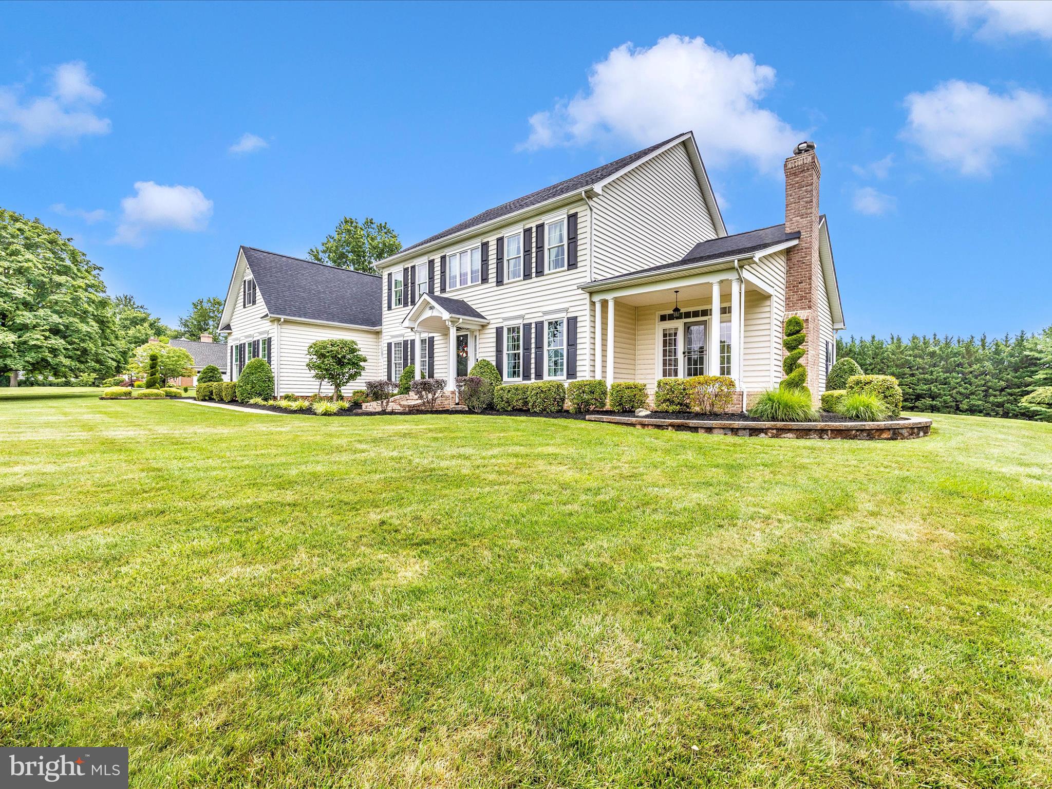 1865 Florence Road Mount Airy, MD 21771 - Photo 119 of 144 a front view of a house with a garden