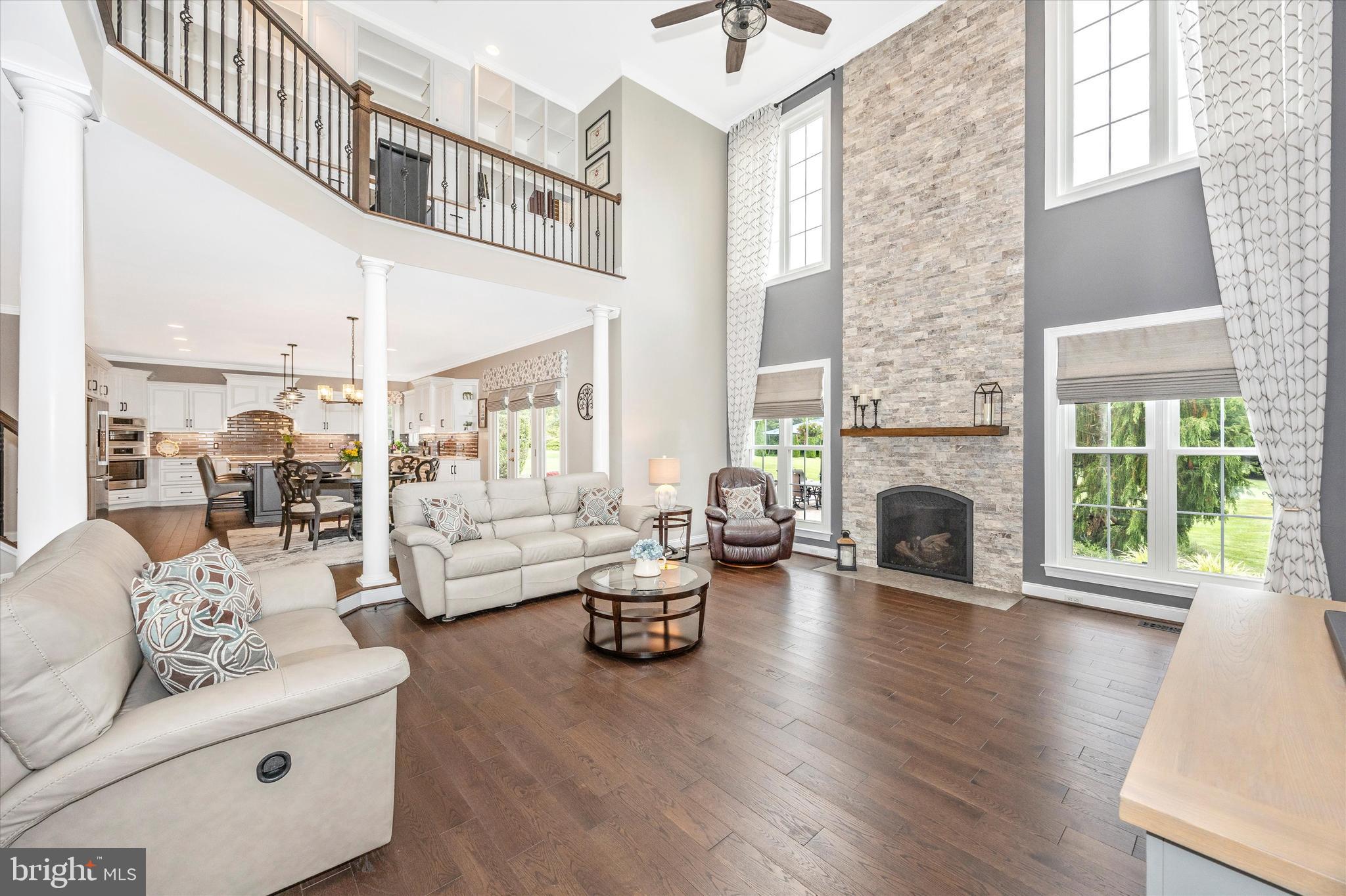 1865 Florence Road Mount Airy, MD 21771 - Photo 13 of 144 a living room with fireplace furniture and a large window