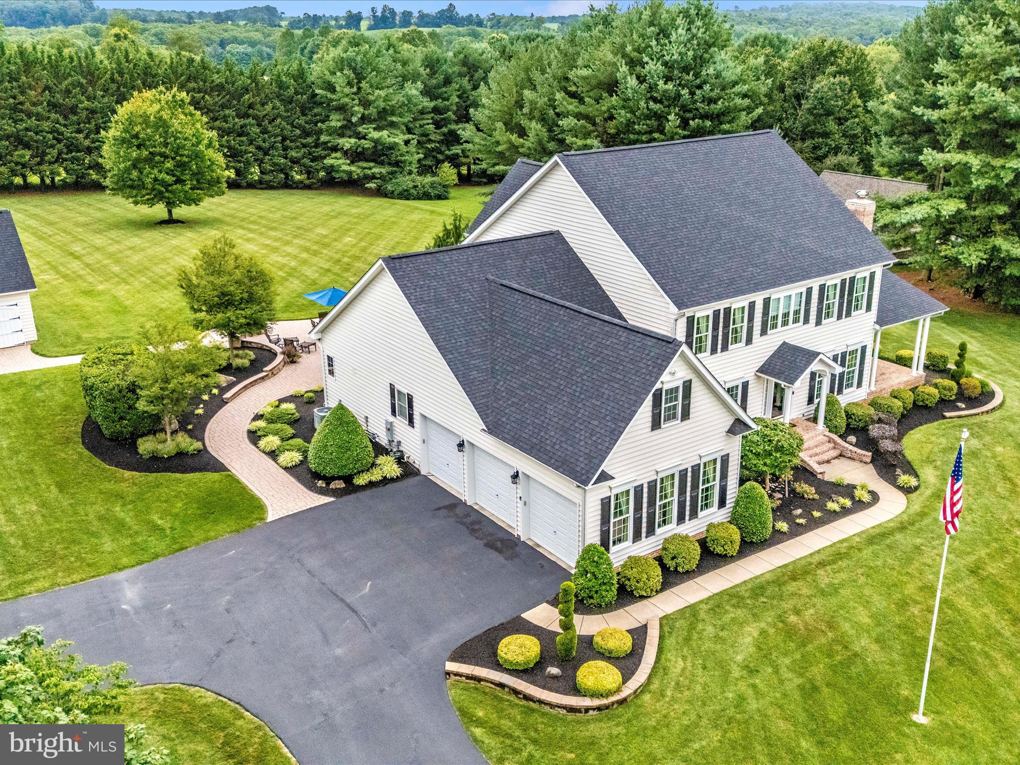 1865 Florence Road Mount Airy, MD 21771 - Photo 136 of 144 a aerial view of a house with a yard table and chairs