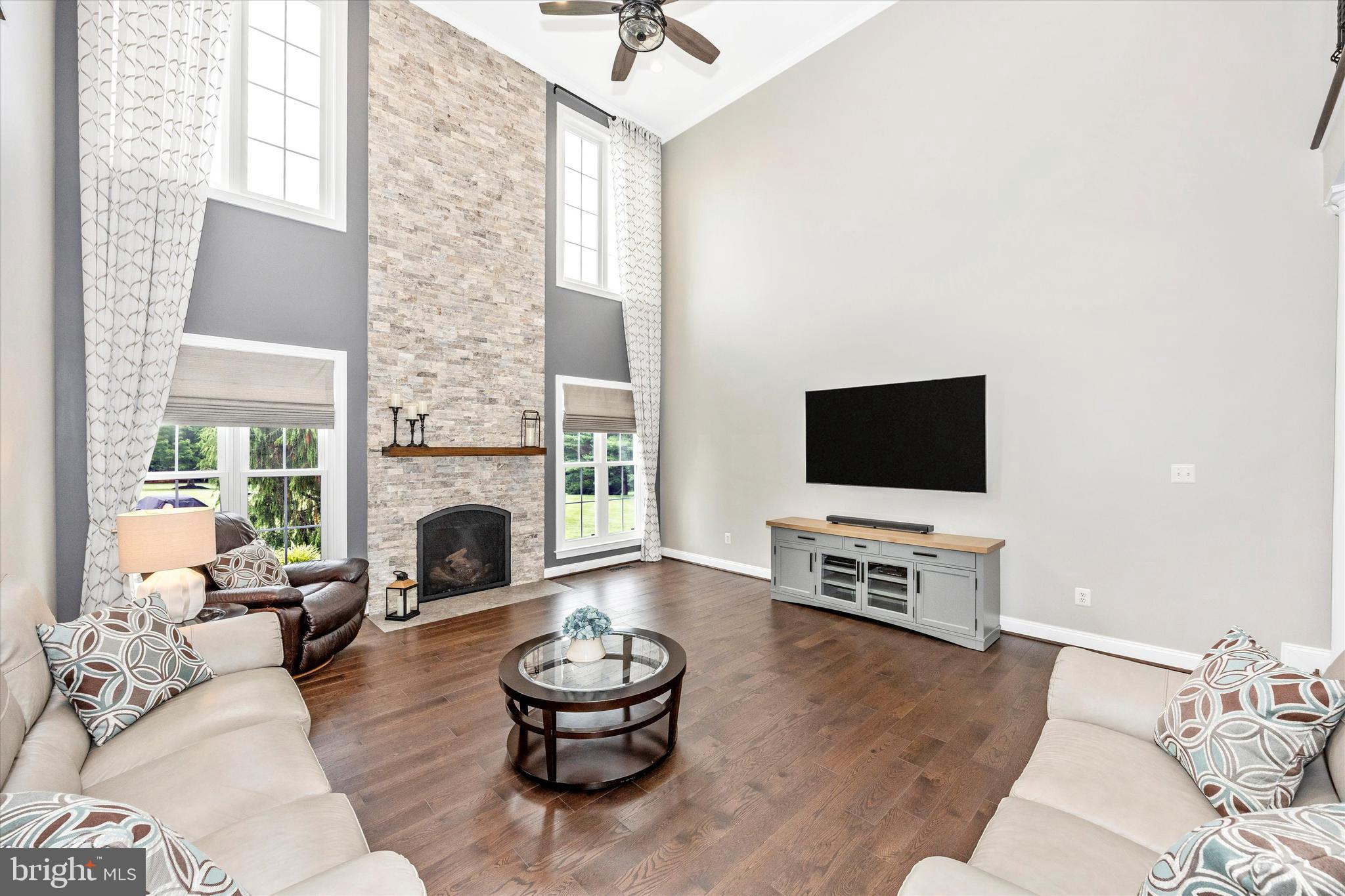 1865 Florence Road Mount Airy, MD 21771 - Photo 14 of 144 a living room with furniture and a flat screen tv