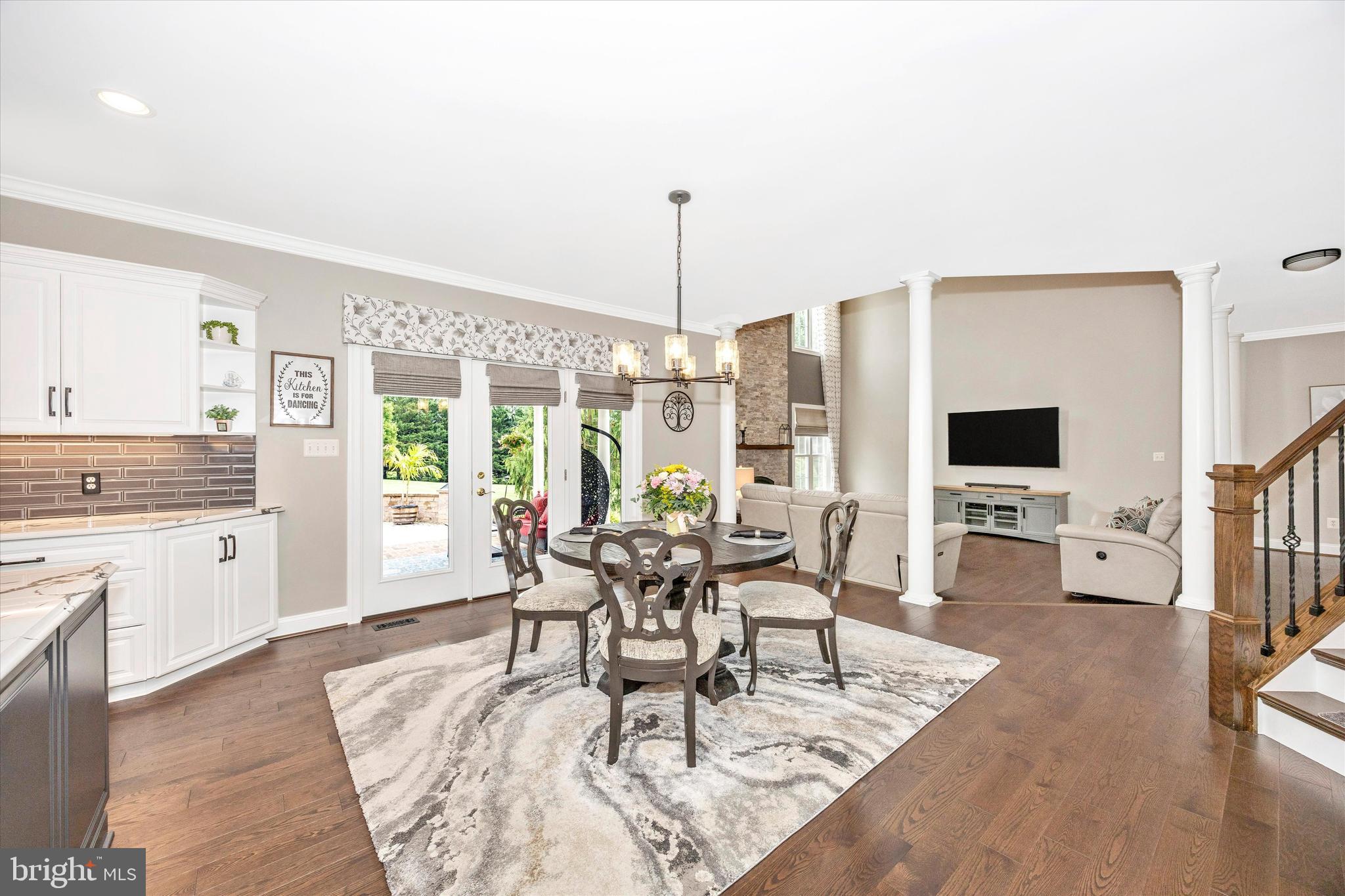 1865 Florence Road Mount Airy, MD 21771 - Photo 19 of 144 a living room with furniture a flat screen tv and a large window