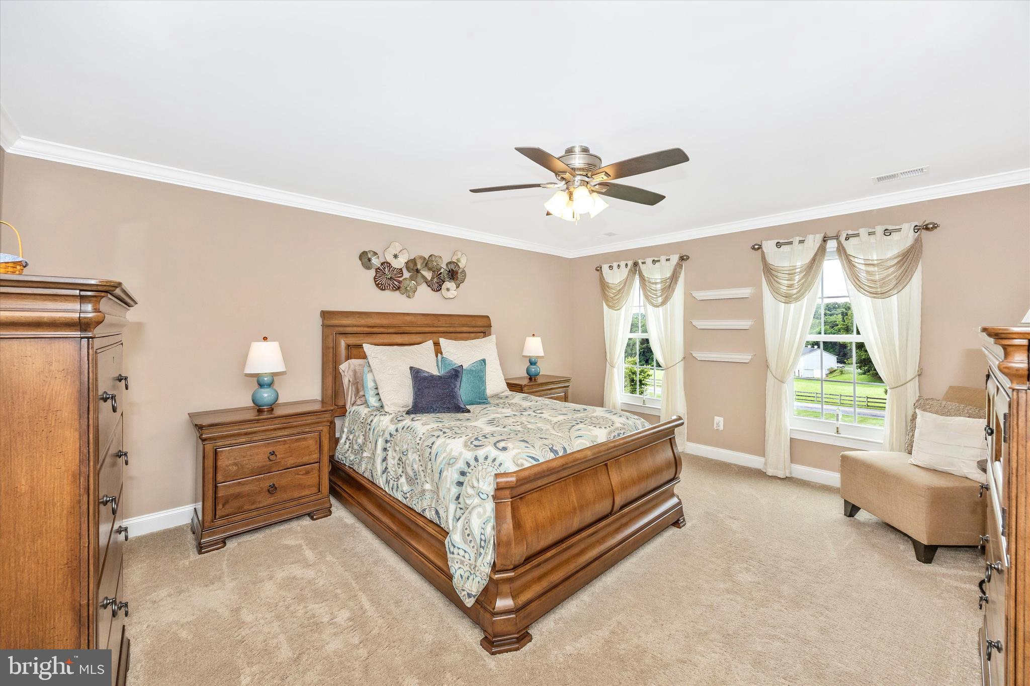 1865 Florence Road Mount Airy, MD 21771 - Photo 34 of 144 a bedroom with a bed and a couch