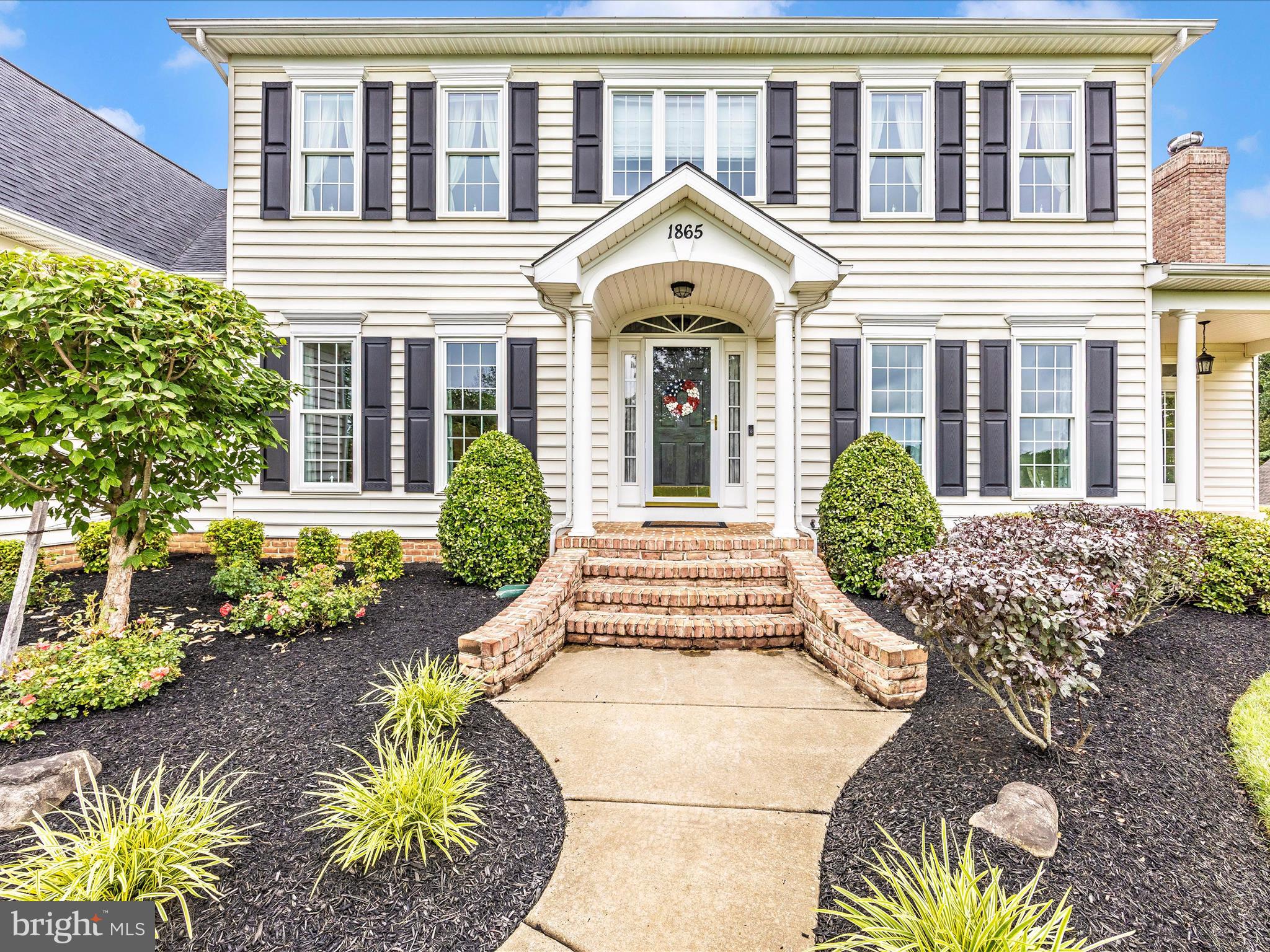 1865 Florence Road Mount Airy, MD 21771 - Photo 74 of 144 a front view of a house with a garden
