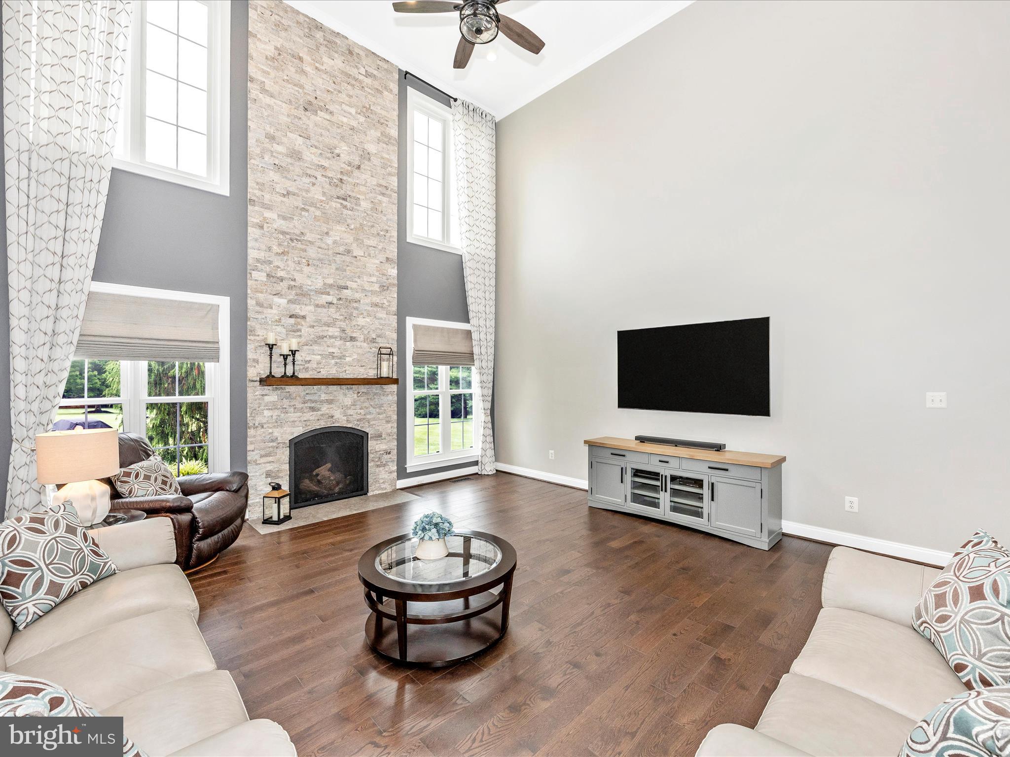 1865 Florence Road Mount Airy, MD 21771 - Photo 86 of 144 a living room with furniture and a flat screen tv