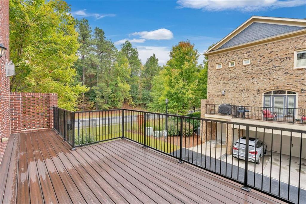 201 Riversgate Drive Atlanta, GA 30339 - Photo 29 of 69 a view of a balcony with wooden floor