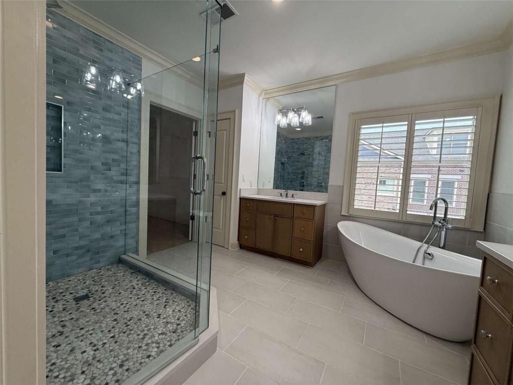 201 Riversgate Drive Atlanta, GA 30339 - Photo 38 of 69 a bathroom with a tub a sink and a shower