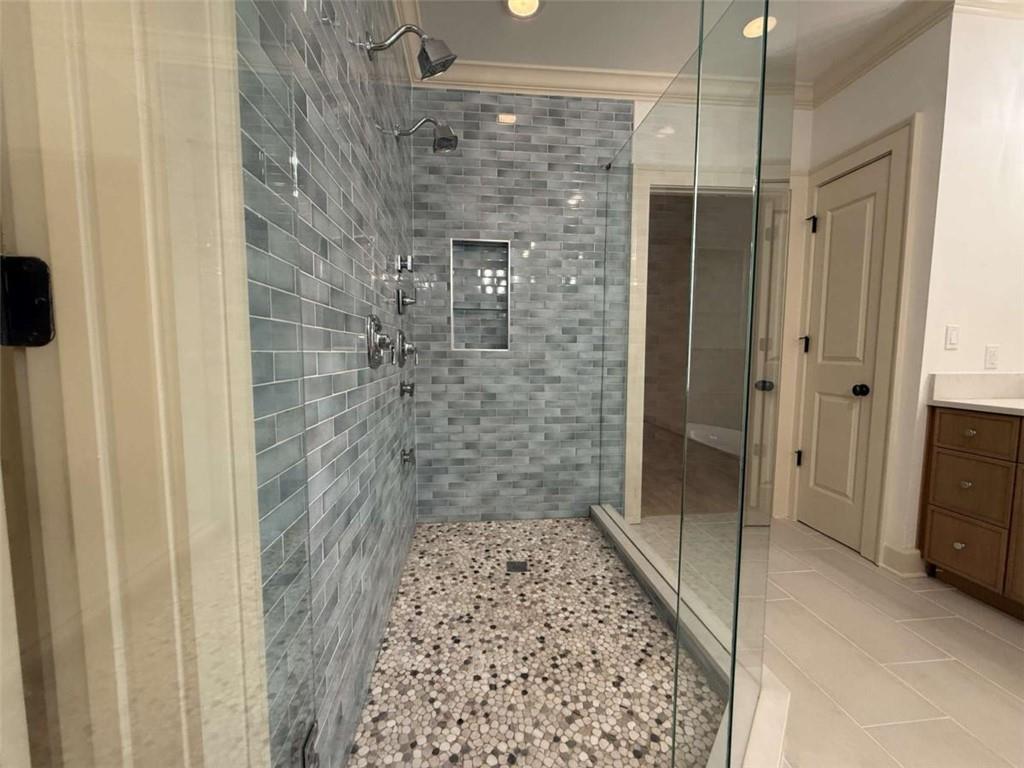 201 Riversgate Drive Atlanta, GA 30339 - Photo 43 of 69 a bathroom with a shower and a sink