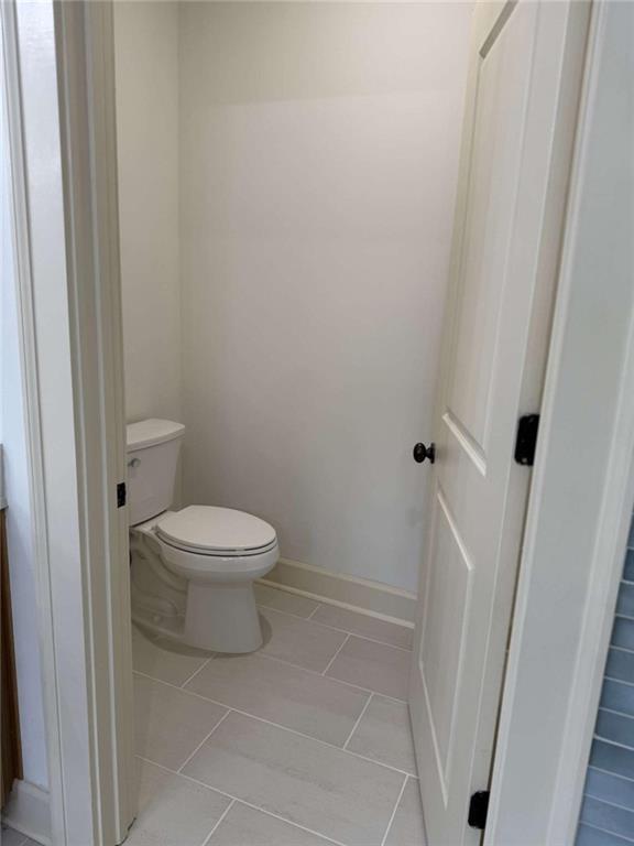 201 Riversgate Drive Atlanta, GA 30339 - Photo 47 of 69 a white toilet sitting next to a white cabinet