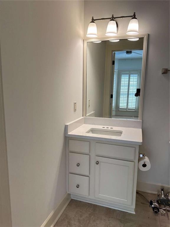 201 Riversgate Drive Atlanta, GA 30339 - Photo 49 of 69 a bathroom with a sink and a mirror