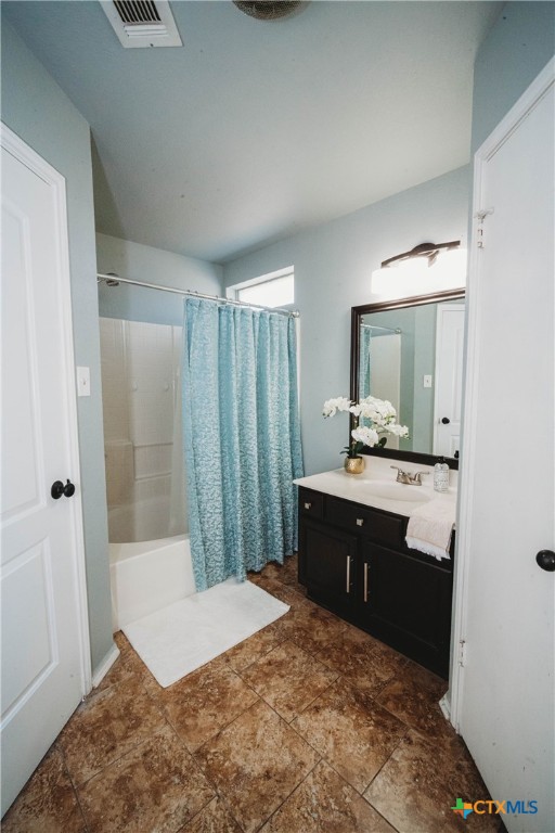 2607 Rampart Loop Killeen, TX 76542 - Photo 22 of 34 a spacious bathroom with a tub sink and mirror
