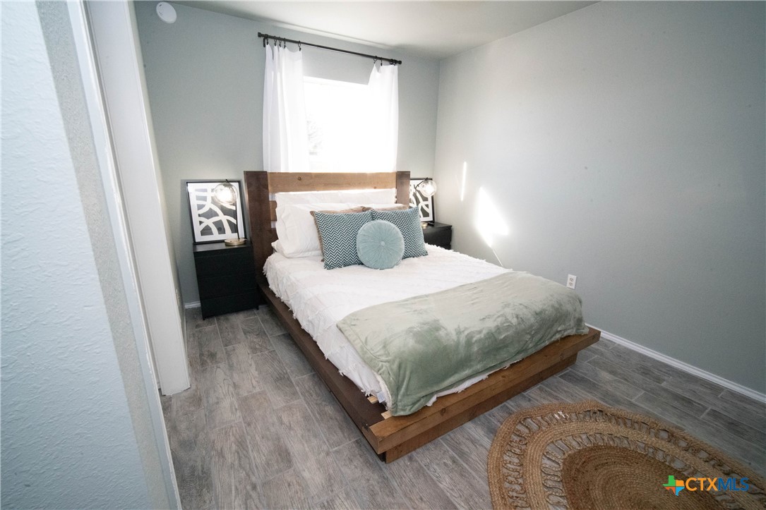2607 Rampart Loop Killeen, TX 76542 - Photo 23 of 34 a bedroom with a bed and window