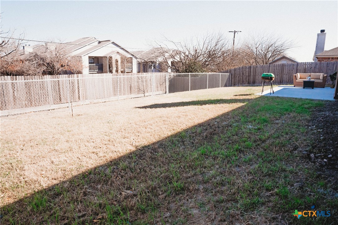 2607 Rampart Loop Killeen, TX 76542 - Photo 32 of 34 a view of a house with a yard covered in snow