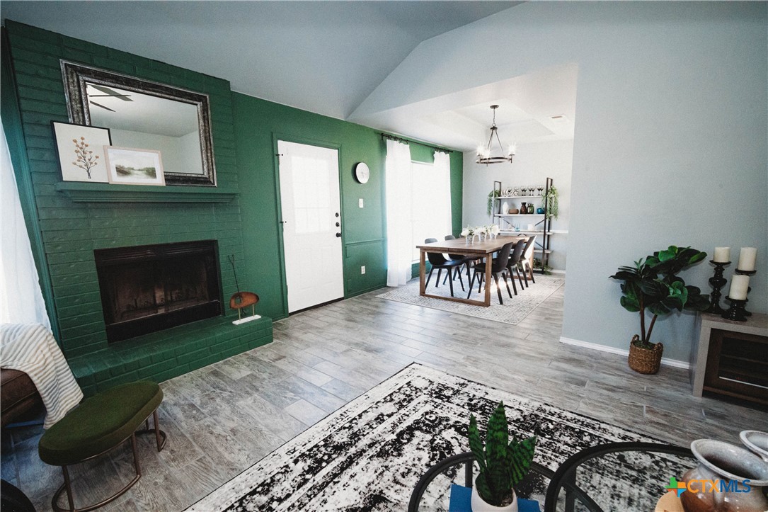2607 Rampart Loop Killeen, TX 76542 - Photo 5 of 34 a living room with furniture and a fireplace