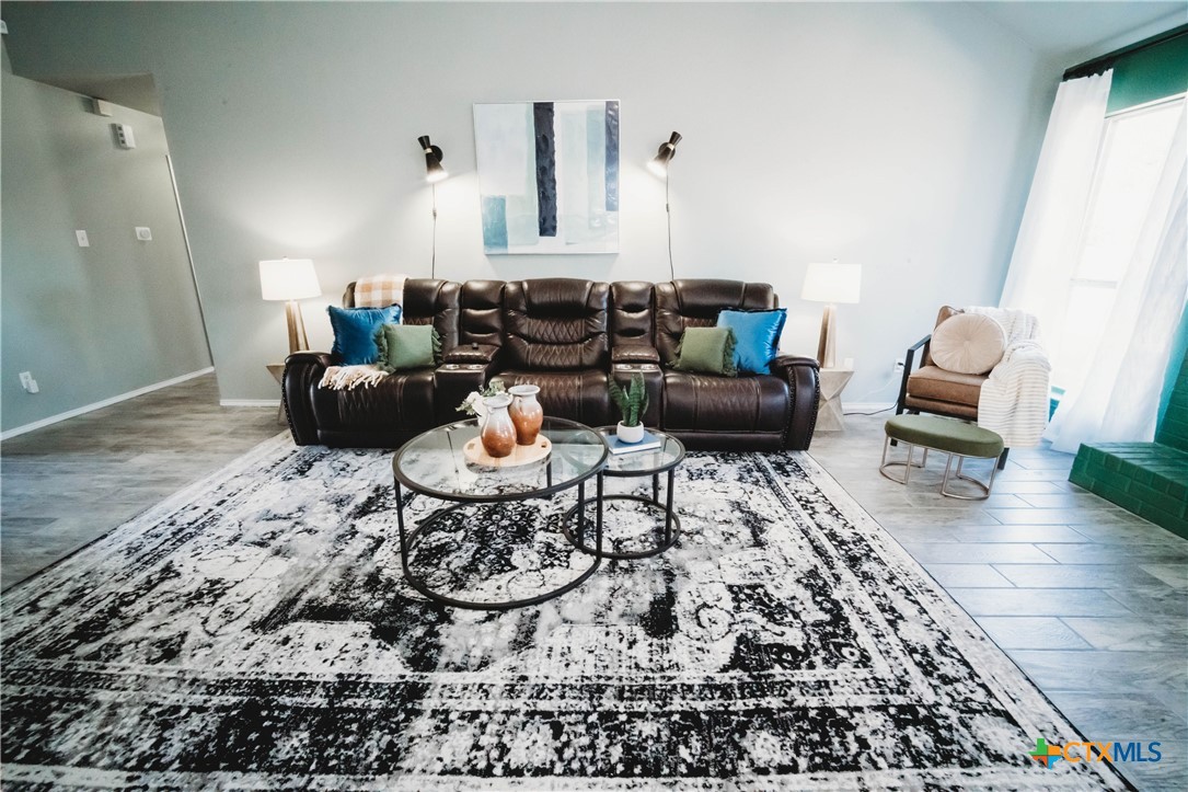 2607 Rampart Loop Killeen, TX 76542 - Photo 6 of 34 a living room with furniture and wooden floor