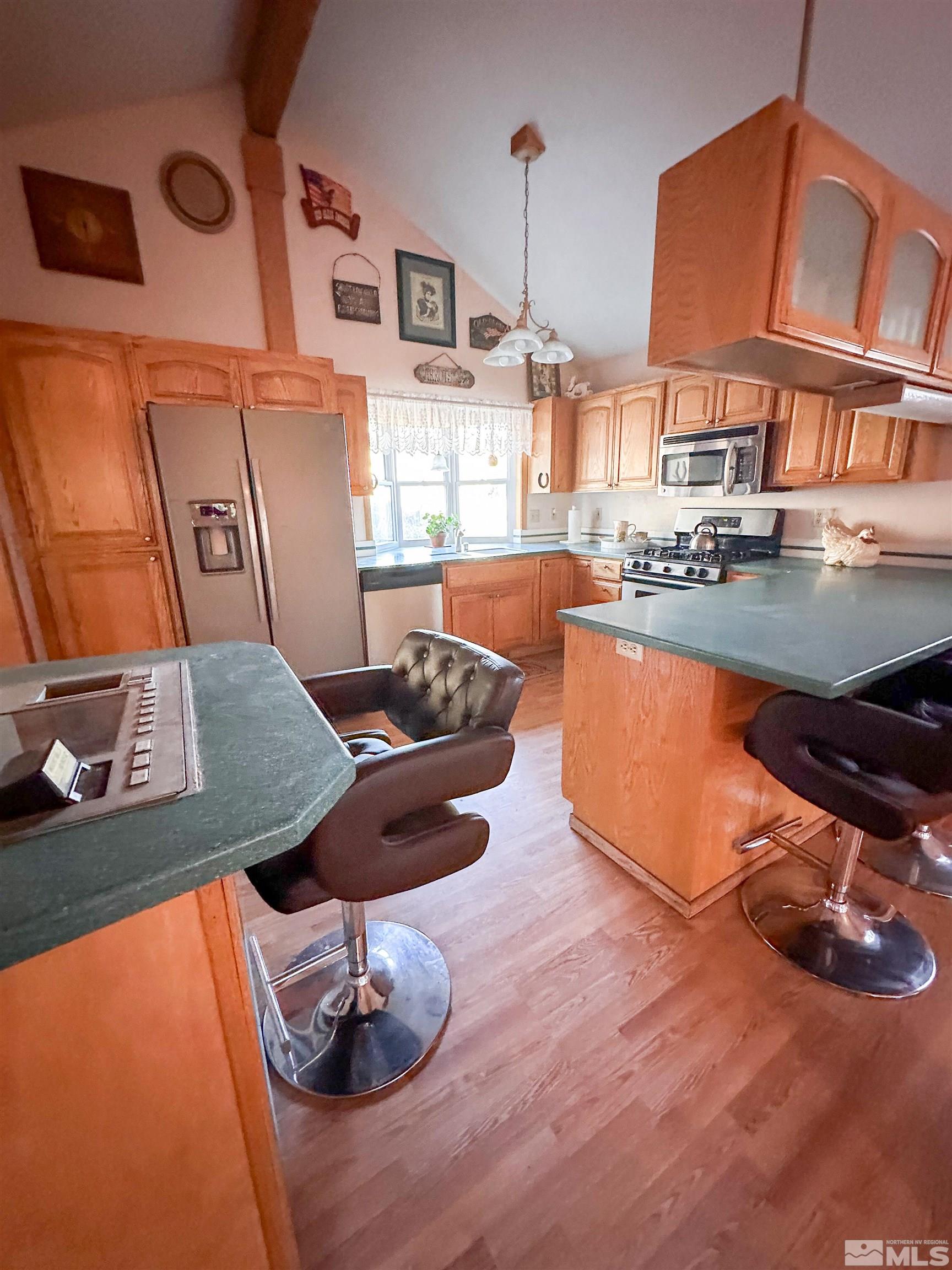 308 Ruby Lane Carson City, NV 89706 - Photo 7 of 32 a view of a living room and kitchen