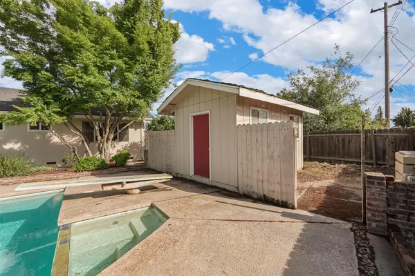 a view of backyard with green space