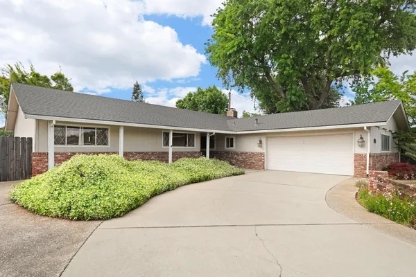 front view of a house with a patio