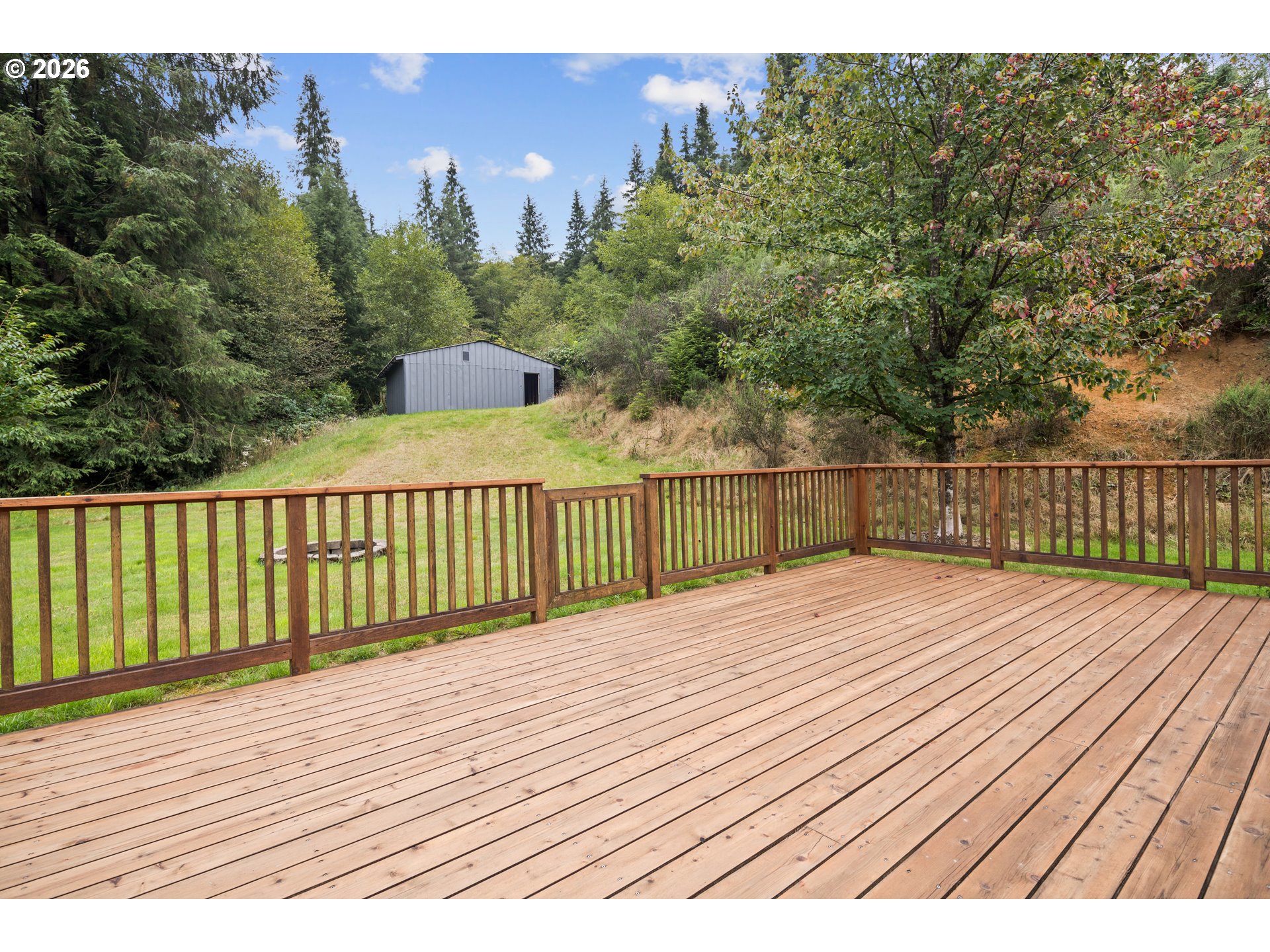 650 Marvin Road Tillamook, OR 97141 - Photo 42 of 48 a view of wooden deck and a garden