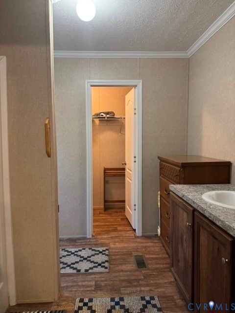 1927 Five Forks Road Pamplin, VA 23958 - Photo 23 of 42 Bathroom vanity with wood-finish cabinetry, light