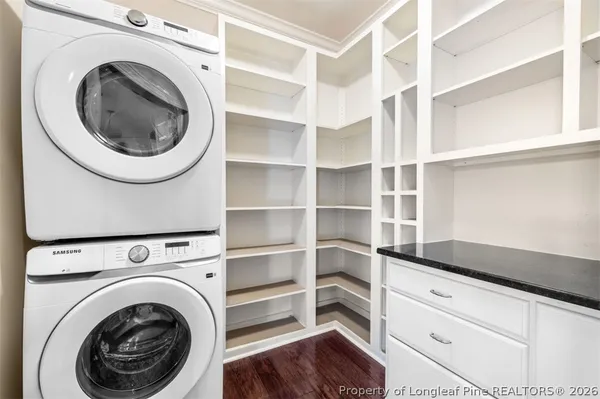 a bathroom with a sink vanity and a mirror