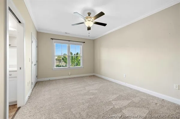 a view of a room with furniture and bicycles