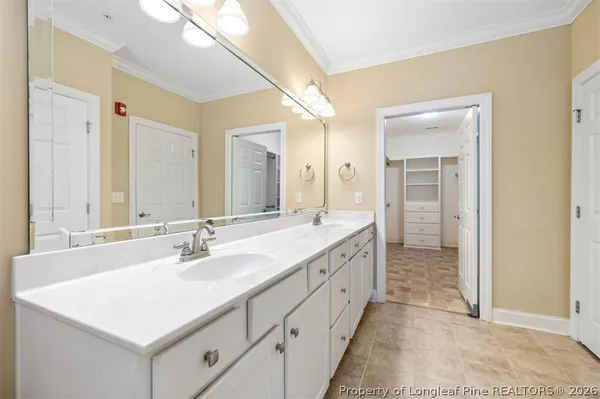 an aerial view of multiple houses with yard