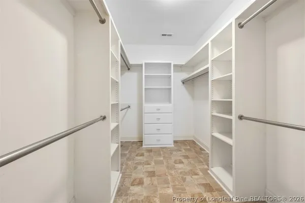 an aerial view of multiple houses with yard