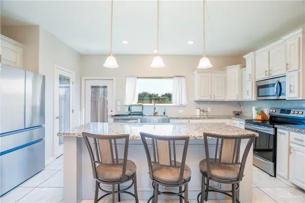 $330,000 | 1201 South Ambrosia Drive, Weslaco, TX 78596