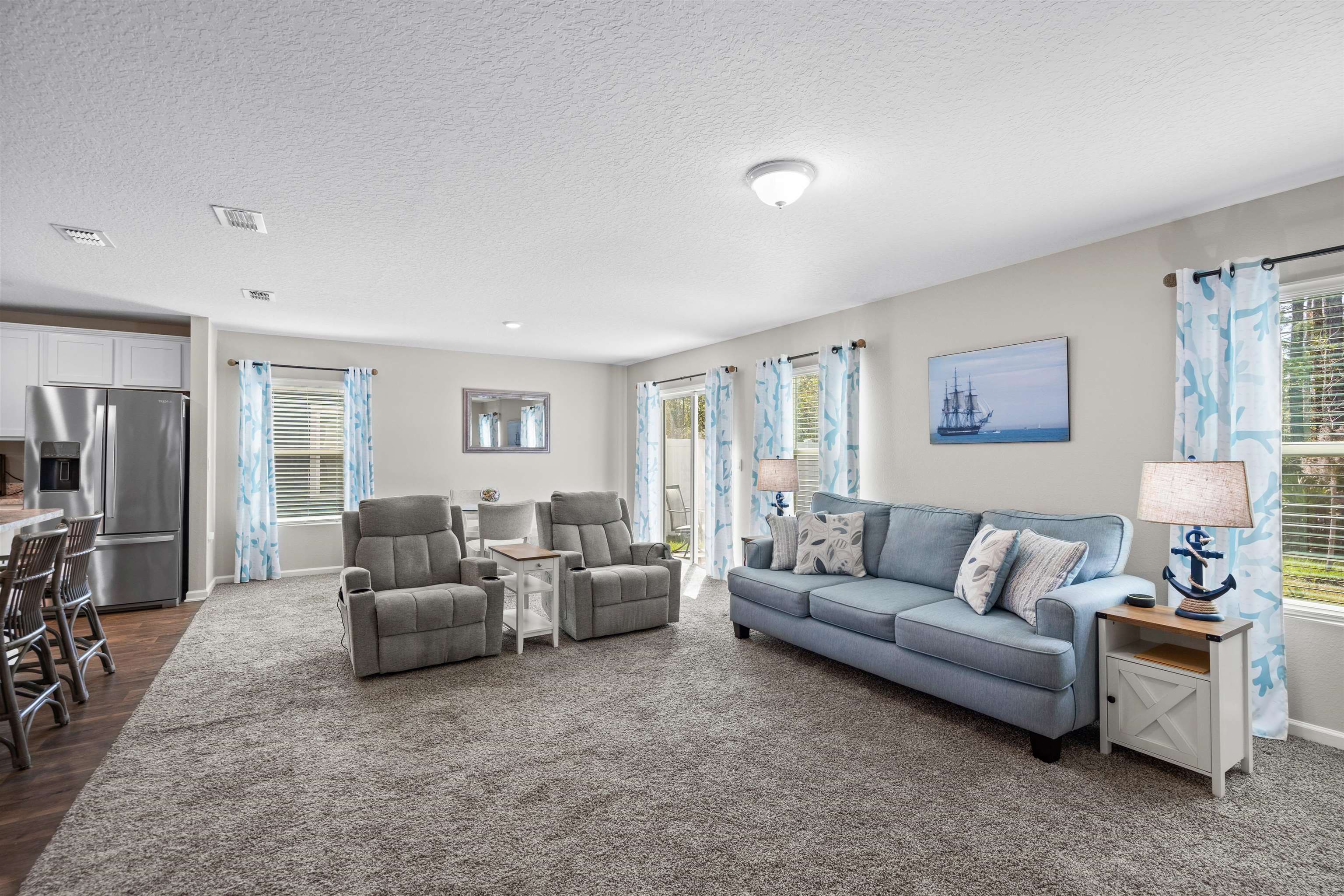 408 Falcon Ridge Road St. Augustine, FL 32084 - Photo 11 of 26 a living room with furniture and a couch